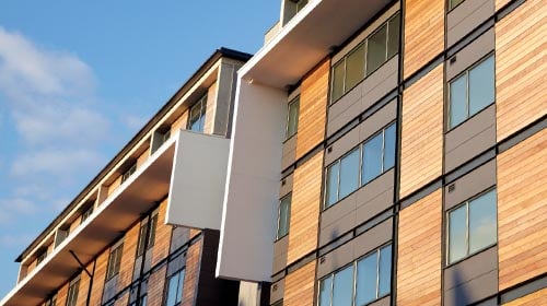 Outside view of what looks to be modern apartments