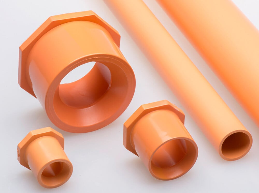pieces of orange CPVC pipe