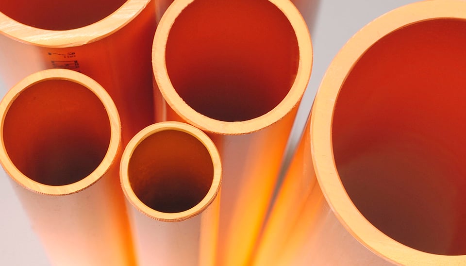 artistic vertical arial view of orange piping