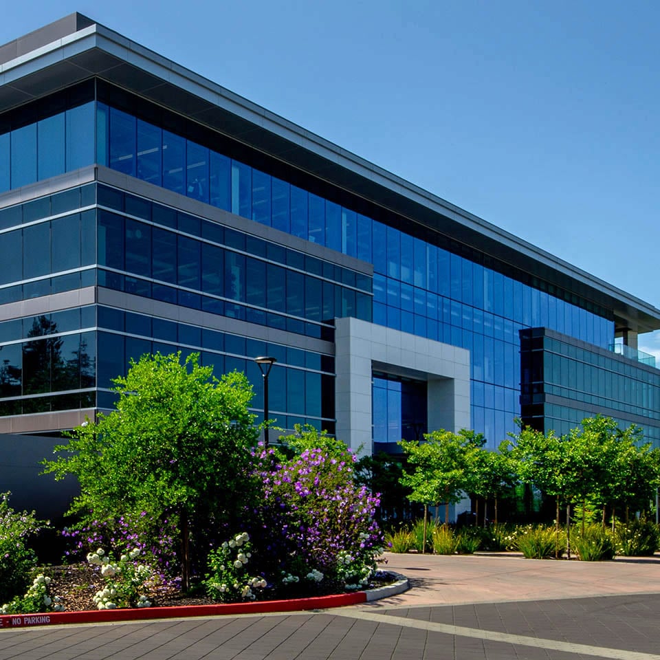Commercial office Building with trees outside.