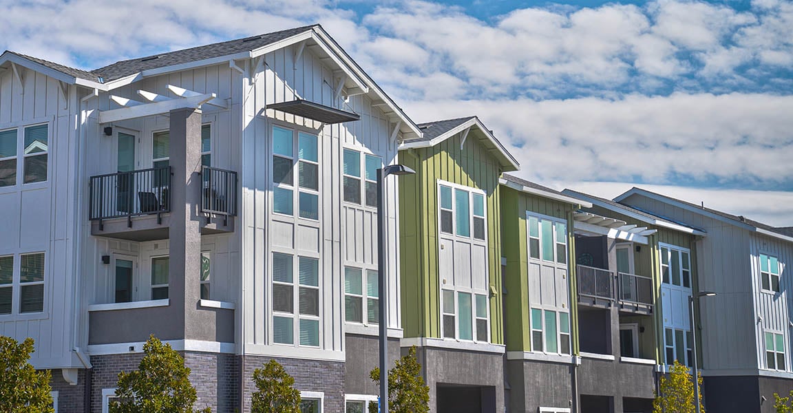 Row of multi-colored residential apartment buildings